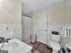Clean bathroom with shower/tub combo and white tile at 4505 Cochran Mill Rd, Fairburn, GA 30213