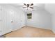Bright bedroom with wood flooring and ample closet space at 370 Oak St, Fayetteville, GA 30215