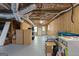 Unfinished basement area with storage and exterior access at 30 Allie Dr, Mcdonough, GA 30252