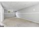 Spacious carpeted basement with white walls at 594 Princeton Dr, Dallas, GA 30157