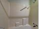 Clean bathroom with a shower/tub combo and grab bar at 3655 Highway 81 W, Hampton, GA 30228