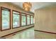 Dining room with wall-to-wall windows and a chandelier at 3655 Highway 81 W, Hampton, GA 30228