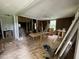 Renovation in progress, large living room with hardwood floors and high ceilings at 36 Railroad St, Kingston, GA 30145