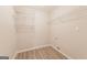 Bright laundry room with wire shelving provides ample storage at 267 Wellington Walk, Douglasville, GA 30134