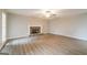 Living room with hardwood floors and a stone fireplace at 267 Wellington Walk, Douglasville, GA 30134