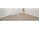 Carpeted bedroom with access to another room at 267 Wellington Walk, Douglasville, GA 30134