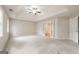 Main bedroom with access to bathroom and walk-in closet at 267 Wellington Walk, Douglasville, GA 30134