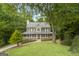 Two-story home with a front porch and landscaped yard at 267 Wellington Walk, Douglasville, GA 30134