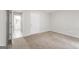 Bedroom with carpet and access to full bathroom at 267 Wellington Walk, Douglasville, GA 30134