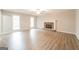 Living room with hardwood floors, fireplace, and ceiling fan at 267 Wellington Walk, Douglasville, GA 30134