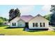 One story home with stone accents and attached garage at 1042 Harbins Rd, Dacula, GA 30019