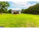 Two-story house with a deck and large backyard at 1042 Harbins Rd, Dacula, GA 30019