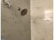Clean shower with marble tile and updated fixtures at 2692 Peppermint Dr, Tucker, GA 30084