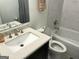Clean bathroom with updated vanity, toilet, and tub at 2692 Peppermint Dr, Tucker, GA 30084