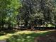Wooded backyard with lush greenery at 2692 Peppermint Dr, Tucker, GA 30084