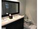 Modern bathroom with double vanity and large mirror at 2692 Peppermint Dr, Tucker, GA 30084