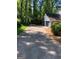 Long driveway leading to a two-car garage at 2692 Peppermint Dr, Tucker, GA 30084