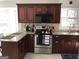 Updated kitchen with granite countertops and stainless steel appliances at 2692 Peppermint Dr, Tucker, GA 30084