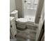 Bathroom with a shower, toilet and white vanity at 1889 Vesta Ave, Atlanta, GA 30344