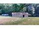 Two small sheds and one large shed at 5110 Macland Rd, Powder Springs, GA 30127