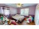 A bedroom with double bed, window, and wood floor at 5110 Macland Rd, Powder Springs, GA 30127
