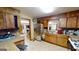 Galley kitchen with stainless steel appliances at 5110 Macland Rd, Powder Springs, GA 30127
