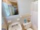 Clean bathroom with white tile and shower/tub combo at 5110 Macland Rd, Powder Springs, GA 30127