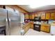 Kitchen with stainless steel appliances and wood cabinets at 5110 Macland Rd, Powder Springs, GA 30127