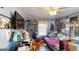 Bedroom with twin bed, collectibles, and window at 5110 Macland Rd, Powder Springs, GA 30127
