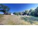Large backyard with open space and trees at 5110 Macland Rd, Powder Springs, GA 30127