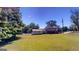House exterior view showcasing a large yard at 5110 Macland Rd, Powder Springs, GA 30127