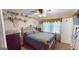 Spacious bedroom with a ceiling fan and wood floors at 5110 Macland Rd, Powder Springs, GA 30127
