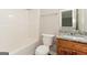 Clean bathroom with granite countertop and wooden vanity at 281 Silver Ridge Dr, Dallas, GA 30157