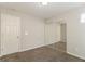 Bright bedroom with mirrored closet doors and neutral carpeting at 281 Silver Ridge Dr, Dallas, GA 30157