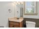 Clean bathroom with single vanity, toilet and shower/tub combo at 100 Belgian Ct, Hampton, GA 30228