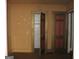 Simple bedroom with closet and hardwood floors at 960 Stone Mountain Lithonia Rd, Lithonia, GA 30058