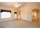 Living room with access to backyard and views to other rooms at 320 Crossroads Dr, Social Circle, GA 30025