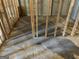 Unfinished basement with framed walls and concrete flooring at 1221 Rhodes Sw Walk, Conyers, GA 30094