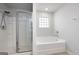 Bathroom with shower and bathtub at 6904 Oak Valley Dr, Douglasville, GA 30134