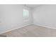 Simple bedroom with neutral decor and carpet at 6904 Oak Valley Dr, Douglasville, GA 30134
