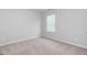 Simple bedroom with neutral decor and carpet at 6904 Oak Valley Dr, Douglasville, GA 30134