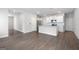 Open concept kitchen with white cabinets, granite counters and stainless steel appliances at 6904 Oak Valley Dr, Douglasville, GA 30134