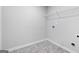 Laundry room with built-in shelving at 6904 Oak Valley Dr, Douglasville, GA 30134