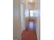 Long hallway with hardwood floors and access to other rooms at 110 Emily Park, Fayetteville, GA 30215