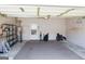 Attached garage with flooring, shelving, and extra storage space at 110 Emily Park, Fayetteville, GA 30215