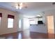 Open floor plan with kitchen, breakfast bar, and living area with hardwood floors at 110 Emily Park, Fayetteville, GA 30215