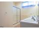 Double vanity bathroom with a shower and tile flooring at 110 Emily Park, Fayetteville, GA 30215