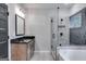 Main bathroom with soaking tub, walk-in shower, and modern vanity at 831 Banks Cir, Carrollton, GA 30116