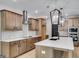 Modern kitchen with stainless steel appliances and a large island at 831 Banks Cir, Carrollton, GA 30116