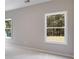 Bright bedroom featuring neutral walls and large windows at 831 Banks Cir, Carrollton, GA 30116